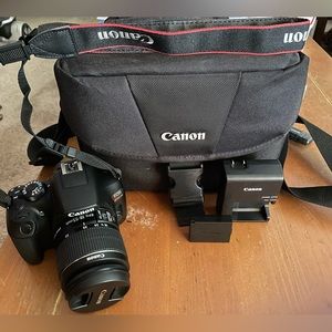 Canon EOS Rebel T6 with lens, battery, battery charger, and canon camera bag